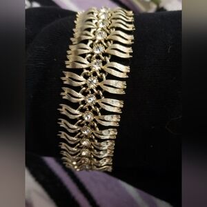 Elegant Lisner Gold Tone Vintage Bracelet with Rhinestone Accents 1950s